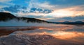 Grand Prismatic Spring under sunset cloudscape in the Midway Geyser Basin in Yellowstone National Park in Wyoming Royalty Free Stock Photo