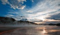 Grand Prismatic Spring under sunset cloudscape in the Midway Geyser Basin in Yellowstone National Park in Wyoming Royalty Free Stock Photo