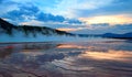 Grand Prismatic Spring under sunset cloudscape in the Midway Geyser Basin in Yellowstone National Park in Wyoming Royalty Free Stock Photo