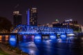 Grand Rapids, Michigan USA - October 9 -2020: Blue Bridge of downtown Grand Rapids glows vibrant after dark