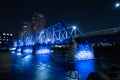 Grand Rapids, Michigan  USA - October 9 -2020: Blue Bridge of downtown Grand Rapids glows vibrant after dark Royalty Free Stock Photo