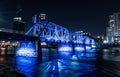 Grand Rapids, Michigan  USA - October 9 -2020: Blue Bridge of downtown Grand Rapids glows vibrant after dark Royalty Free Stock Photo