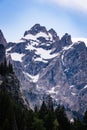 Grand Teton mountains and surrounding forest and grass area in Grand Teton National Park, Wyoming. Royalty Free Stock Photo