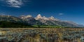 Grand Teton National Park landscape with greenery and high hills against the blue sky in Wyoming Royalty Free Stock Photo