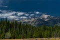 Grand Teton National Park landscape with trees and high hills against the blue sky in Wyoming Royalty Free Stock Photo