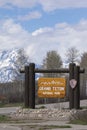 Grand Teton National Park sign with mountains in background Royalty Free Stock Photo