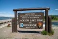 Grand Teton National Park, Wyoming - June 26, 2020: Sign for the Jackson Lake Dam and Reservior, part of the US Department of the Royalty Free Stock Photo