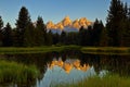 The Grand Teton sunrise reflection at Schwabacher`s Landing in Grand Teton National Park Royalty Free Stock Photo