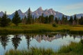 The Grand Teton sunrise reflection at Schwabacher`s Landing in Grand Teton National Park