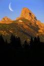 Grand Tetons and Table Mountain at Sunset with Crescent Moon Royalty Free Stock Photo