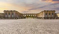 Grand Trianon palace in Versailles park outside Paris at sunset, France Royalty Free Stock Photo