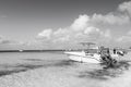 Grand Turk, Turks and Caicos Islands - December 29, 2015: motor boats and people on sea beach. Powerboats on sunny