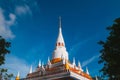 Grand white pagoda of Wat Pha Kho temple in summer day, Songkhla - Thailand