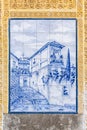 Granda, Spain. August 17th, 2019. The scene of old Granada on the azulejos tiles of the streets of Alcaiceria by the artist M.