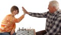 Grandad and granddaughter make a compromise in chess Royalty Free Stock Photo