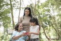 Granddaughter have surprise to grandmother sitting