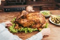 granddaughter looking at delicious roasted turkey cooked by grandma Royalty Free Stock Photo