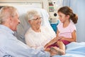 Granddaughter Visiting Grandmother In Hospital Bed Royalty Free Stock Photo
