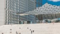 The Grande Arche with stairs timelapse in the Defence business district of Paris, France. Royalty Free Stock Photo