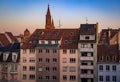 City skyline at sunset with Notre Dame Cathedral spire Strasbourg, France Royalty Free Stock Photo
