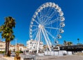 Grande Roue Ferris Wheel at Promenade de la Pantiero square aside yacht port in Cannes in France