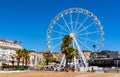 Grande Roue Ferris Wheel at Promenade de la Pantiero square aside yacht marina in Cannes in France