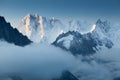 Grandes Jorasses and Mer de Glace behind the clouds. Winter season in France. First snow in Chamonix valley in Haute Savoie. Royalty Free Stock Photo