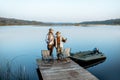 Grandfather with adult son fishing on the lake Royalty Free Stock Photo