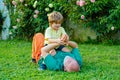 Grandfather carrying his grandson having fun in the park at the sunset time. Healthcare family lifestyle. Portrait of Royalty Free Stock Photo