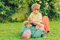 Grandfather carrying his grandson having fun in the park at the sunset time. Healthcare family lifestyle. Portrait of Royalty Free Stock Photo