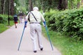 Grandfather with crutches