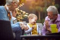 Grandfather  enjoying and playing  with their grandson Royalty Free Stock Photo