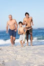 Grandfather, Father and Grandson Running Royalty Free Stock Photo