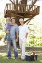 Grandfather, Father And Son Building Tree House Together Royalty Free Stock Photo