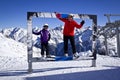 Grandfather and girl enjoying winter sports