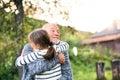 Grandfather giving his grandaughter a hug. Royalty Free Stock Photo