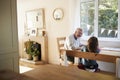 Grandfather And Granddaughter Colouring Picture Together Royalty Free Stock Photo