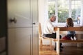 Grandfather And Granddaughter Colouring Picture Together Royalty Free Stock Photo