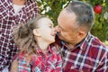 grandfather with granddaughter. Multi generation family enjoying in the park Royalty Free Stock Photo