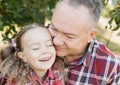 grandfather with granddaughter. Multi generation family enjoying in the park Royalty Free Stock Photo