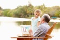 Grandfather With Granddaughter Outdoors Painting Landscape Royalty Free Stock Photo