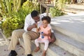 Grandfather And Granddaughter Playing With Bubbles Together Royalty Free Stock Photo