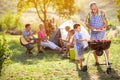 Grandfather and grandson at barbecue grill