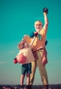 Grandfather and grandson with basketball ball and yoga mat in hands. Father and son having workout. Fathers day. Father Royalty Free Stock Photo