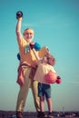 Grandfather and grandson with basketball ball and yoga mat in hands. Father and son having workout. Fathers day. Father Royalty Free Stock Photo