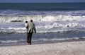 Grandfather and grandson at beach