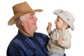 Grandfather and grandson in a cowboy hat. Royalty Free Stock Photo