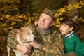 Grandfather, grandson and dog Royalty Free Stock Photo