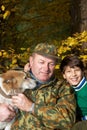 Grandfather, grandson and dog Royalty Free Stock Photo