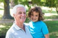 grandfather and grandson having fun in a park